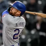 Rangers blanquean a Rockies con 16 hits y Rocker domina desde el relevo