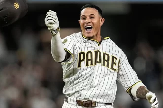 Machado firma el walk off y los Padres remontan para hundir a los Bravos en extra