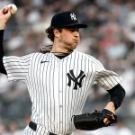 Schlittler receta 13 ponches y los Yankees blanquean a los Rojos